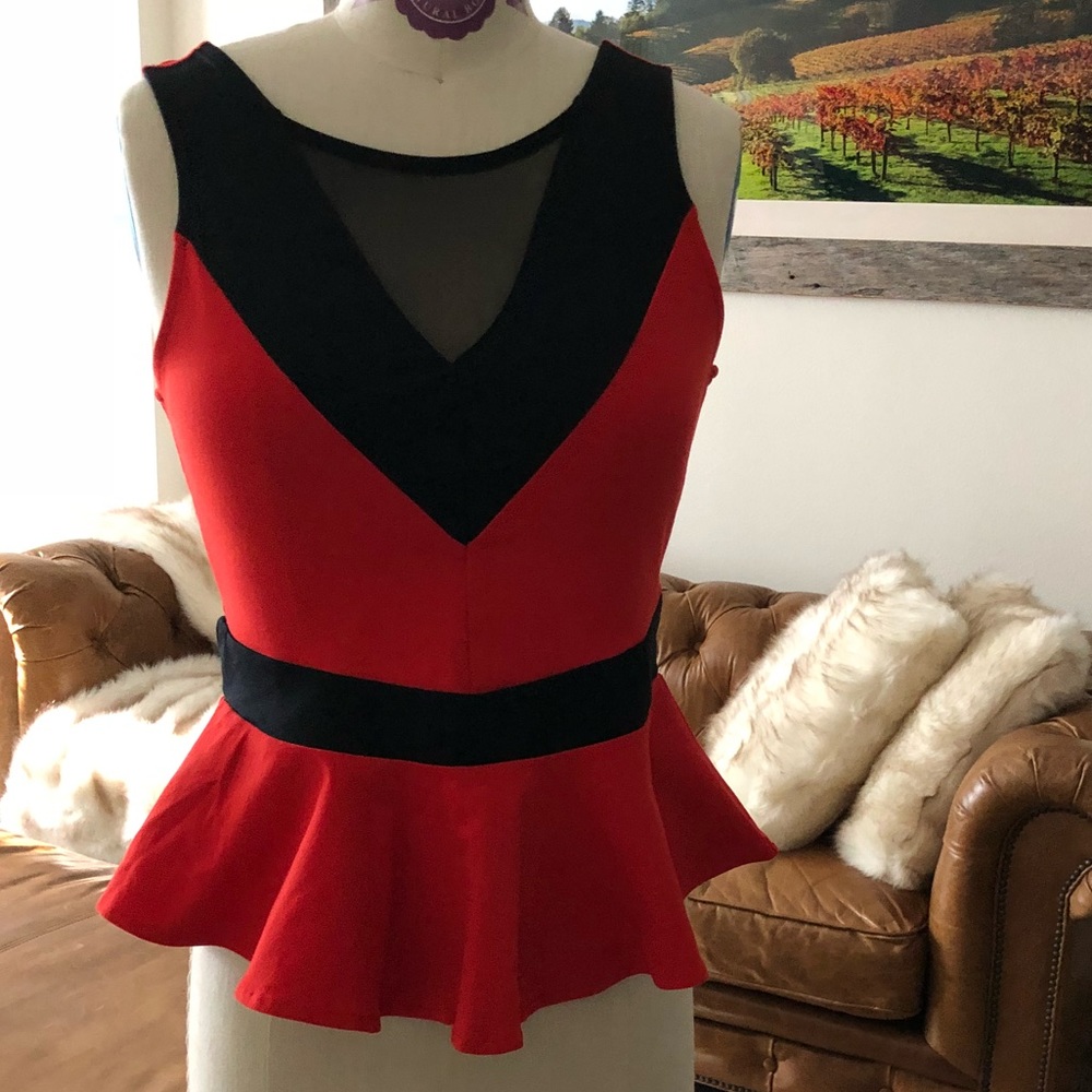 Bebe peplum top orang/ black color